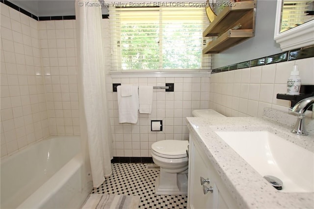 1500 Longridge Rd, Charleston, WV 25314 - bathroom with tile walls, vanity, and shower / bath combo with shower curtain