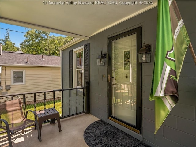 567 Garrison Ave, Charleston, WV 25302 - doorway to property featuring concrete block siding and a balcony