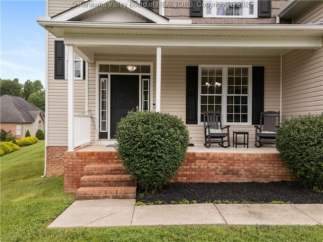 35 Hyde Park Rd, Winfield, WV 25213 - doorway to property featuring a porch and a lawn