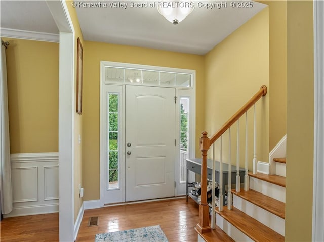 35 Hyde Park Rd, Winfield, WV 25213 - entryway featuring healthy amount of natural light, wood-type flooring, and stairs
