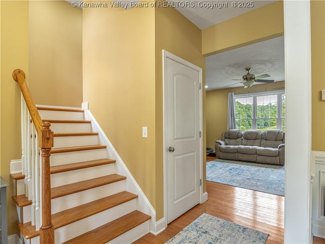 35 Hyde Park Rd, Winfield, WV 25213 - stairs with wood finished floors and a ceiling fan
