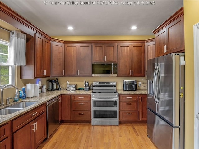 35 Hyde Park Rd, Winfield, WV 25213 - kitchen featuring stainless steel appliances, light wood-style flooring, light stone counters, and recessed lighting