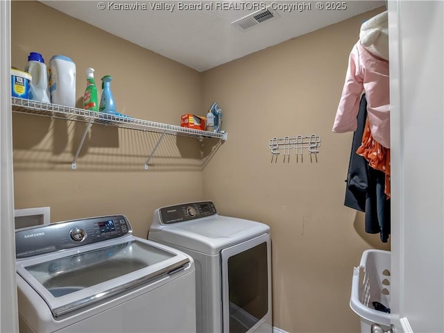 35 Hyde Park Rd, Winfield, WV 25213 - laundry room with washing machine and clothes dryer and baseboards