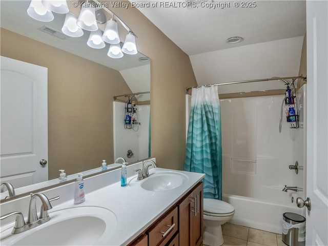 35 Hyde Park Rd, Winfield, WV 25213 - full bathroom featuring double vanity, tile patterned floors, shower / bath combination with curtain, and vaulted ceiling
