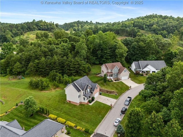 35 Hyde Park Rd, Winfield, WV 25213 - aerial view of property and surrounding area featuring a heavily wooded area