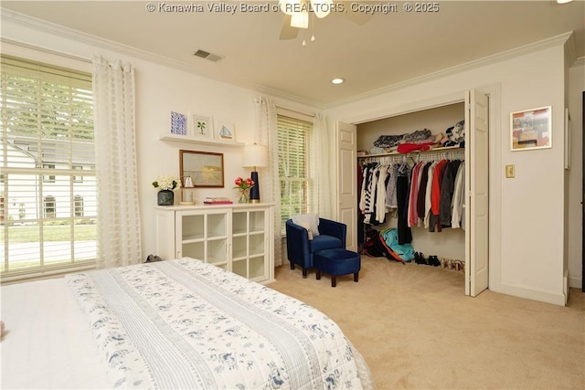 135 E Ridge Rd, Charleston, WV 25314 - carpeted bedroom featuring crown molding, a closet, multiple windows, a ceiling fan, and recessed lighting
