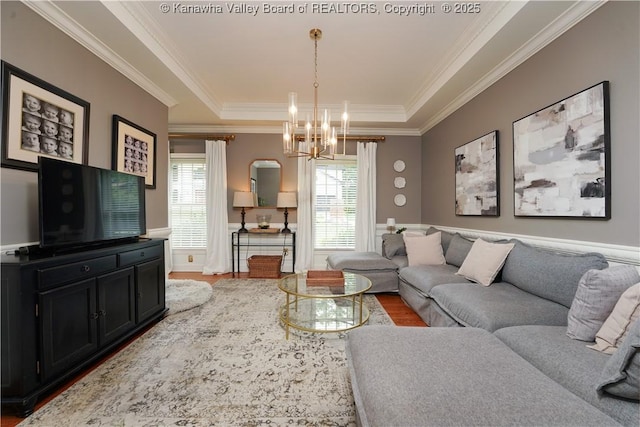 135 E Ridge Rd, Charleston, WV 25314 - living area with a chandelier, crown molding, a tray ceiling, and wood finished floors