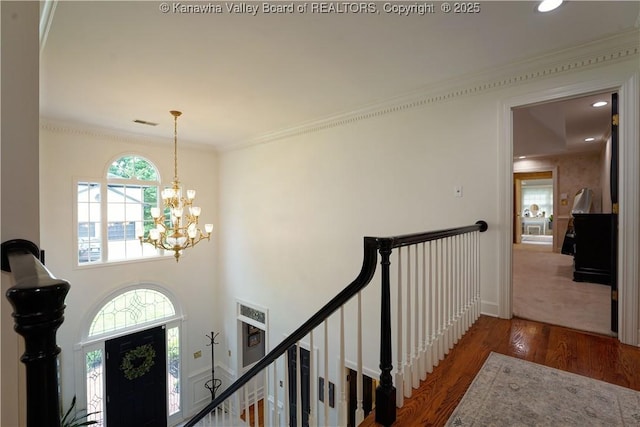 135 E Ridge Rd, Charleston, WV 25314 - entrance foyer featuring wood finished floors, a chandelier, ornamental molding, and recessed lighting