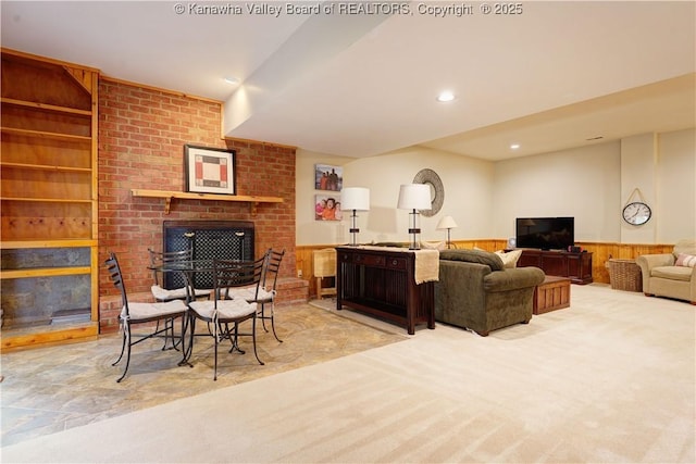 135 E Ridge Rd, Charleston, WV 25314 - living room featuring a wainscoted wall, a fireplace, recessed lighting, and wooden walls