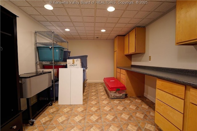 135 E Ridge Rd, Charleston, WV 25314 - kitchen with dark countertops, built in study area, and recessed lighting