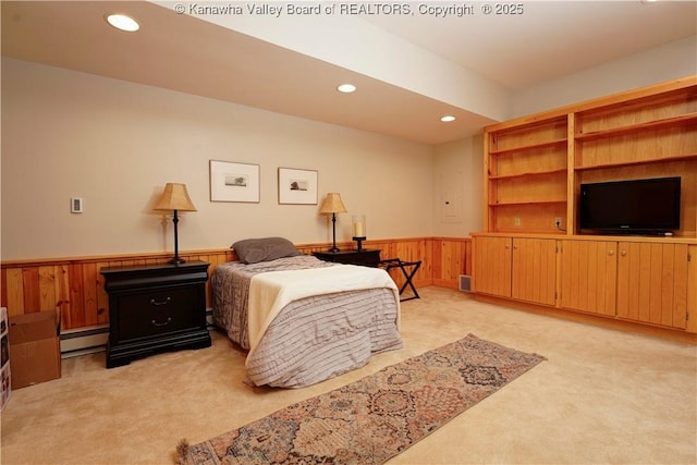 135 E Ridge Rd, Charleston, WV 25314 - bedroom featuring light carpet, a baseboard radiator, wainscoting, recessed lighting, and wooden walls