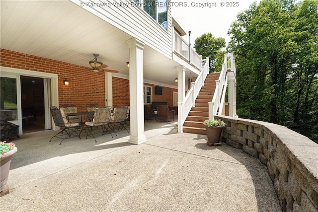 135 E Ridge Rd, Charleston, WV 25314 - view of patio with outdoor dining area, stairway, and ceiling fan