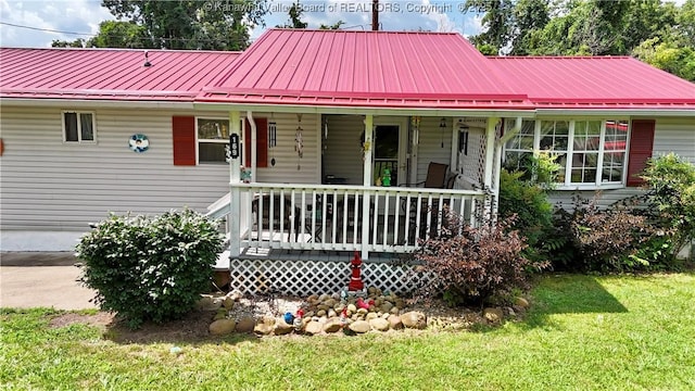 169 Myrtle Tree Rd, South Charleston, WV 25309 - view of front of property with a front yard, covered porch, and a metal roof