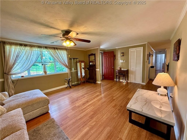 169 Myrtle Tree Rd, South Charleston, WV 25309 - living area with a ceiling fan, wood finished floors, ornamental molding, and a textured ceiling