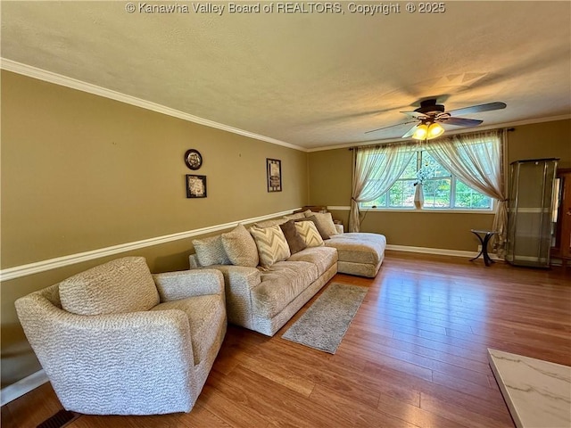 169 Myrtle Tree Rd, South Charleston, WV 25309 - living area with a ceiling fan, wood finished floors, and ornamental molding