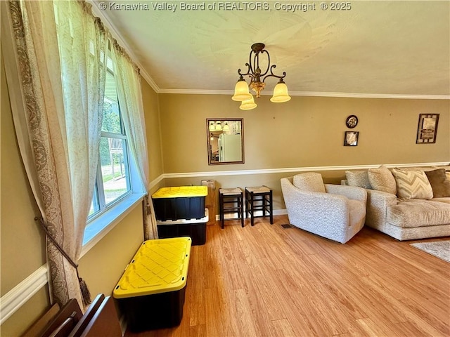 169 Myrtle Tree Rd, South Charleston, WV 25309 - living room with a chandelier, wood finished floors, and crown molding