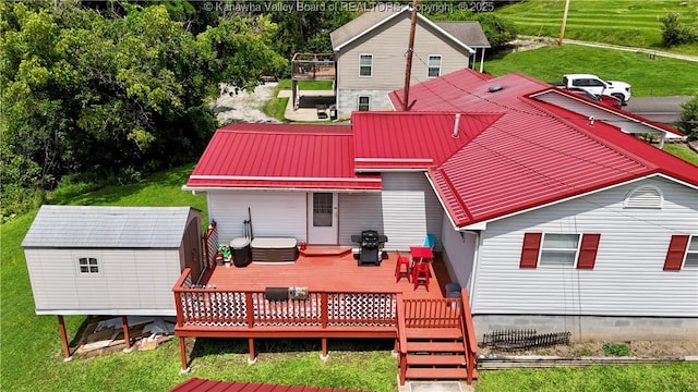 169 Myrtle Tree Rd, South Charleston, WV 25309 - rear view of house featuring a wooden deck, a shed, a metal roof, and a yard