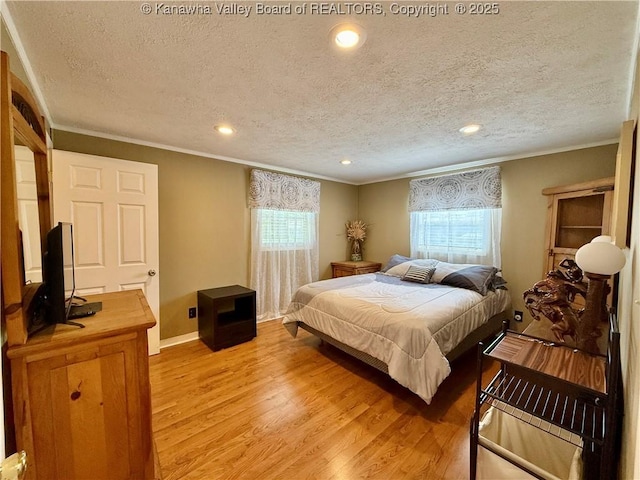 169 Myrtle Tree Rd, South Charleston, WV 25309 - bedroom with a textured ceiling, crown molding, light wood-style floors, and recessed lighting