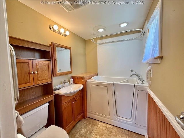 169 Myrtle Tree Rd, South Charleston, WV 25309 - bathroom featuring a bath and vanity