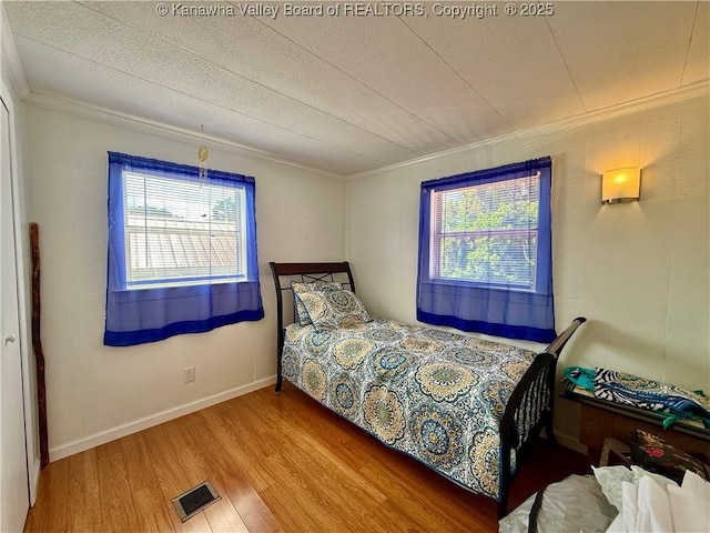 169 Myrtle Tree Rd, South Charleston, WV 25309 - bedroom featuring ornamental molding and wood finished floors