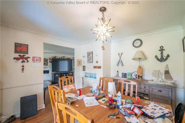 1324 Kanawha Ave, Dunbar, WV 25064 - dining area featuring crown molding, a chandelier, and wood finished floors