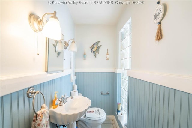 1324 Kanawha Ave, Dunbar, WV 25064 - bathroom with toilet and a wainscoted wall