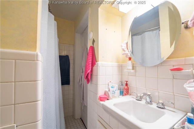 1324 Kanawha Ave, Dunbar, WV 25064 - full bathroom featuring a sink and tile walls
