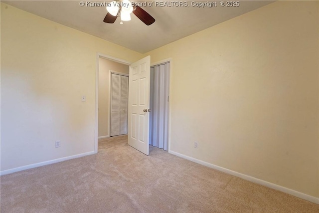 55 Corky Dr, Poca, WV 25159 - unfurnished bedroom with light carpet, a closet, and a ceiling fan