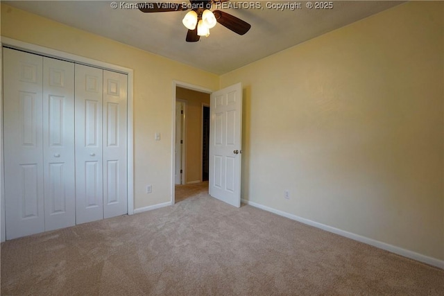 55 Corky Dr, Poca, WV 25159 - unfurnished bedroom featuring carpet, a closet, and a ceiling fan