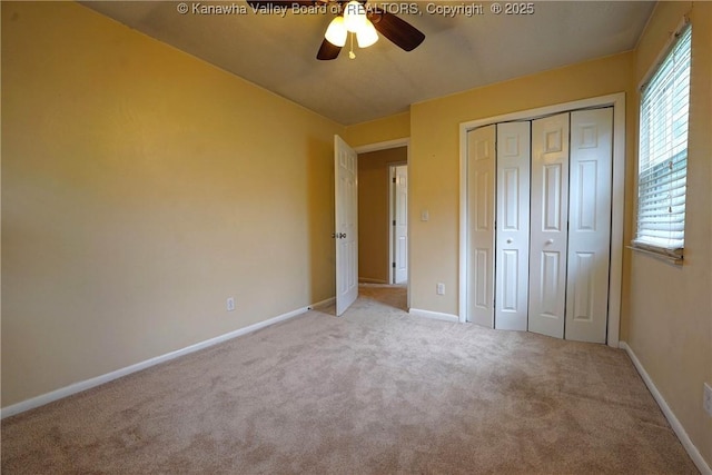 55 Corky Dr, Poca, WV 25159 - unfurnished bedroom featuring carpet floors, a closet, and ceiling fan