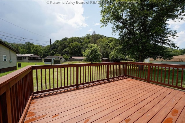 55 Corky Dr, Poca, WV 25159 - wooden deck featuring a storage shed and a yard