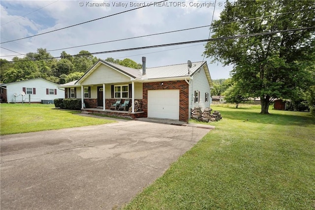 55 Corky Dr, Poca, WV 25159 - ranch-style home featuring covered porch, an attached garage, concrete driveway, a front lawn, and a metal roof