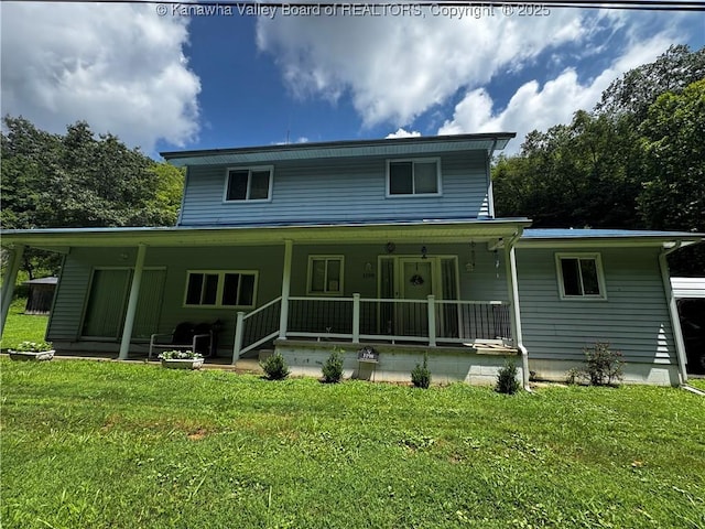 1198 Caney Branch Rd, Chapmanville, WV 25508 - rear view of house featuring a porch and a yard