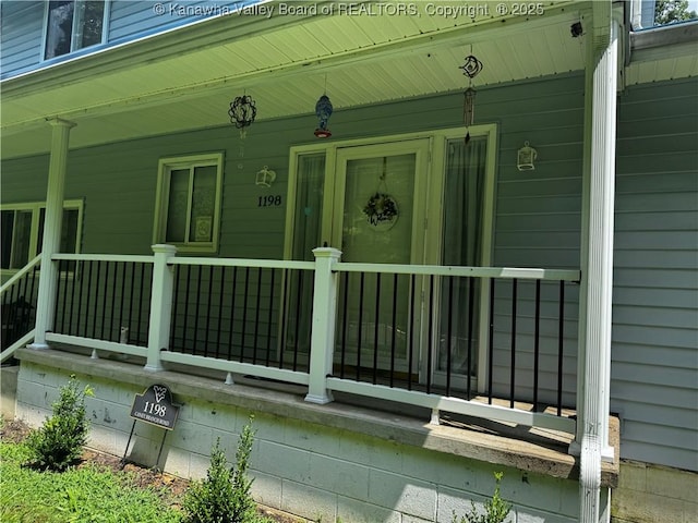 1198 Caney Branch Rd, Chapmanville, WV 25508 - property entrance featuring covered porch