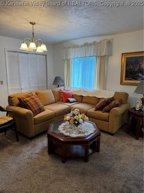 1198 Caney Branch Rd, Chapmanville, WV 25508 - carpeted living area with a chandelier and a textured ceiling
