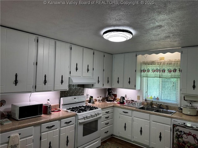 1198 Caney Branch Rd, Chapmanville, WV 25508 - kitchen with white range with gas cooktop, under cabinet range hood, dishwashing machine, white cabinets, and a textured ceiling