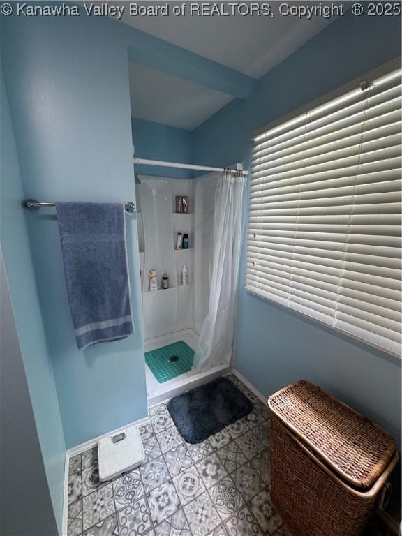 1198 Caney Branch Rd, Chapmanville, WV 25508 - full bath with curtained shower and baseboards
