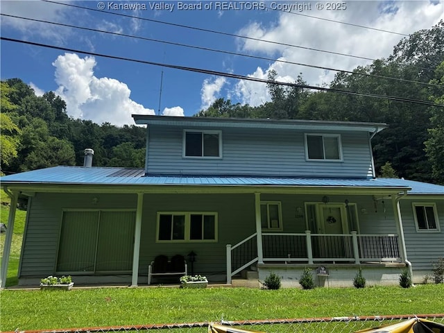 1198 Caney Branch Rd, Chapmanville, WV 25508 - back of house with a porch, a metal roof, and a lawn