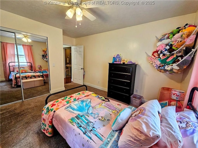 438 Tanglewood Dr, Point Pleasant, WV 25550 - carpeted bedroom with a closet and a ceiling fan