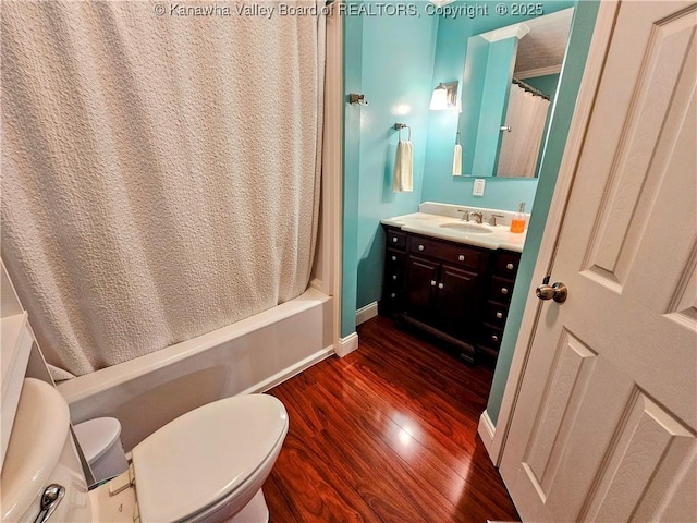 438 Tanglewood Dr, Point Pleasant, WV 25550 - bathroom with wood finished floors, vanity, and shower / bath combo