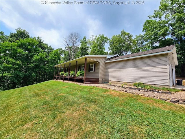 438 Tanglewood Dr, Point Pleasant, WV 25550 - view of home's exterior featuring a yard and a central AC unit