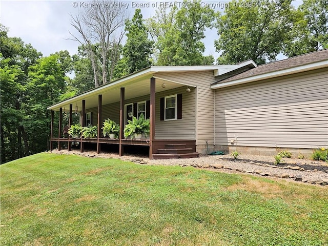 438 Tanglewood Dr, Point Pleasant, WV 25550 - view of side of home featuring a porch and a yard