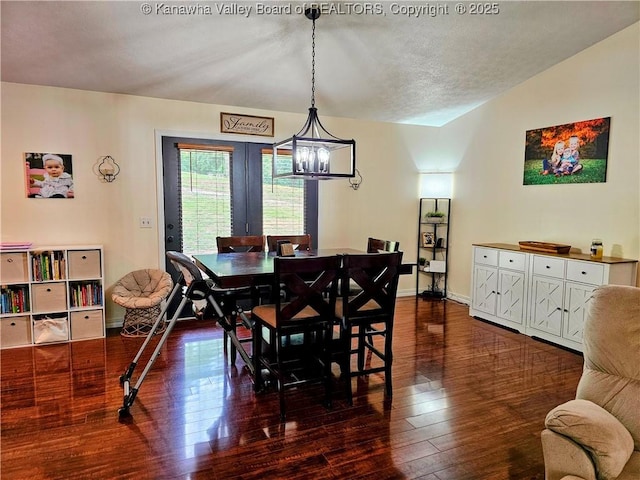 438 Tanglewood Dr, Point Pleasant, WV 25550 - dining area with hardwood / wood-style flooring and a chandelier