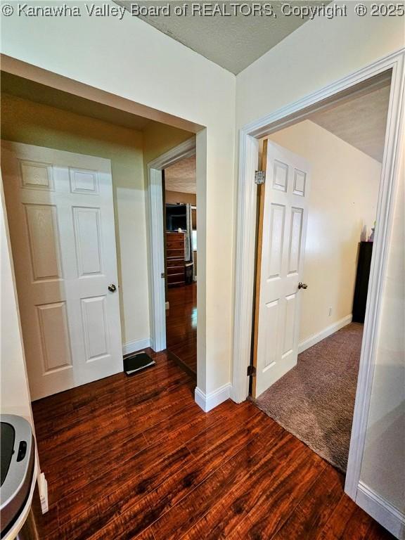 438 Tanglewood Dr, Point Pleasant, WV 25550 - hallway featuring wood finished floors and baseboards