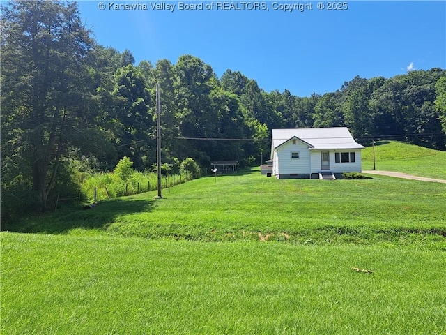 588 Saunders Creek Rd, Milton, WV 25541 - view of grassy yard with a forest view