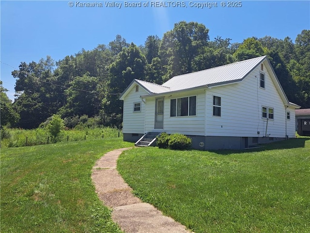 588 Saunders Creek Rd, Milton, WV 25541 - view of front of property featuring a front yard and a metal roof