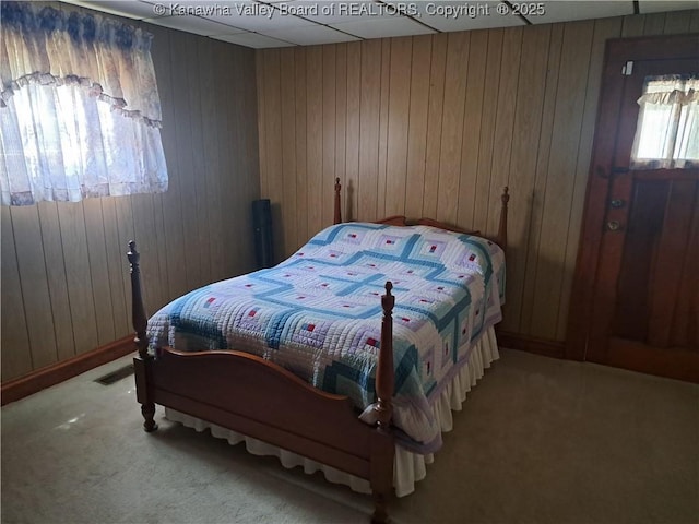 588 Saunders Creek Rd, Milton, WV 25541 - carpeted bedroom with wooden walls