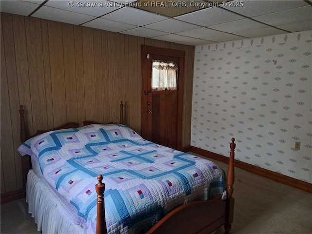 588 Saunders Creek Rd, Milton, WV 25541 - carpeted bedroom with a drop ceiling and wooden walls