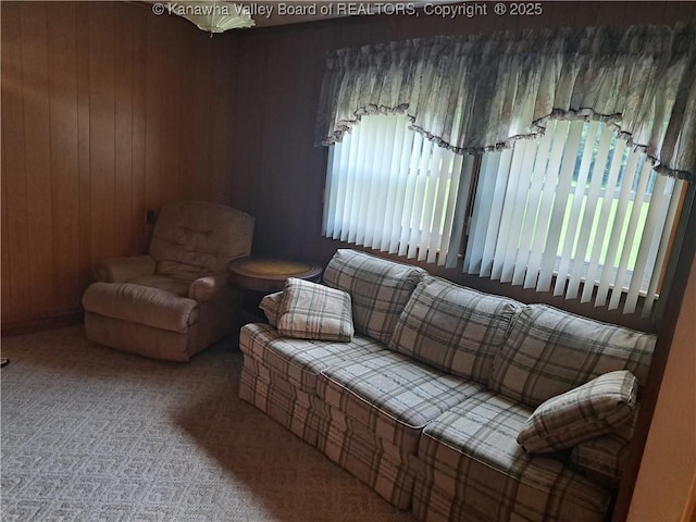 588 Saunders Creek Rd, Milton, WV 25541 - carpeted living area with healthy amount of natural light and wooden walls