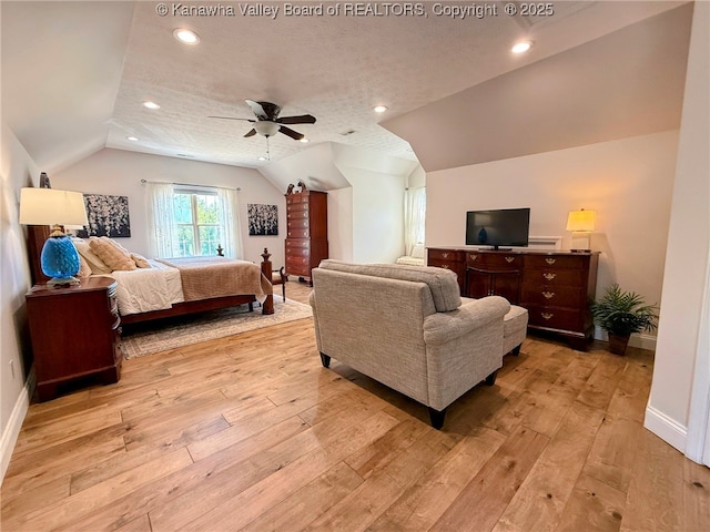 255 Stoney Brook Dr, Point Pleasant, WV 25550 - bedroom featuring lofted ceiling, light wood-style floors, recessed lighting, a ceiling fan, and a textured ceiling